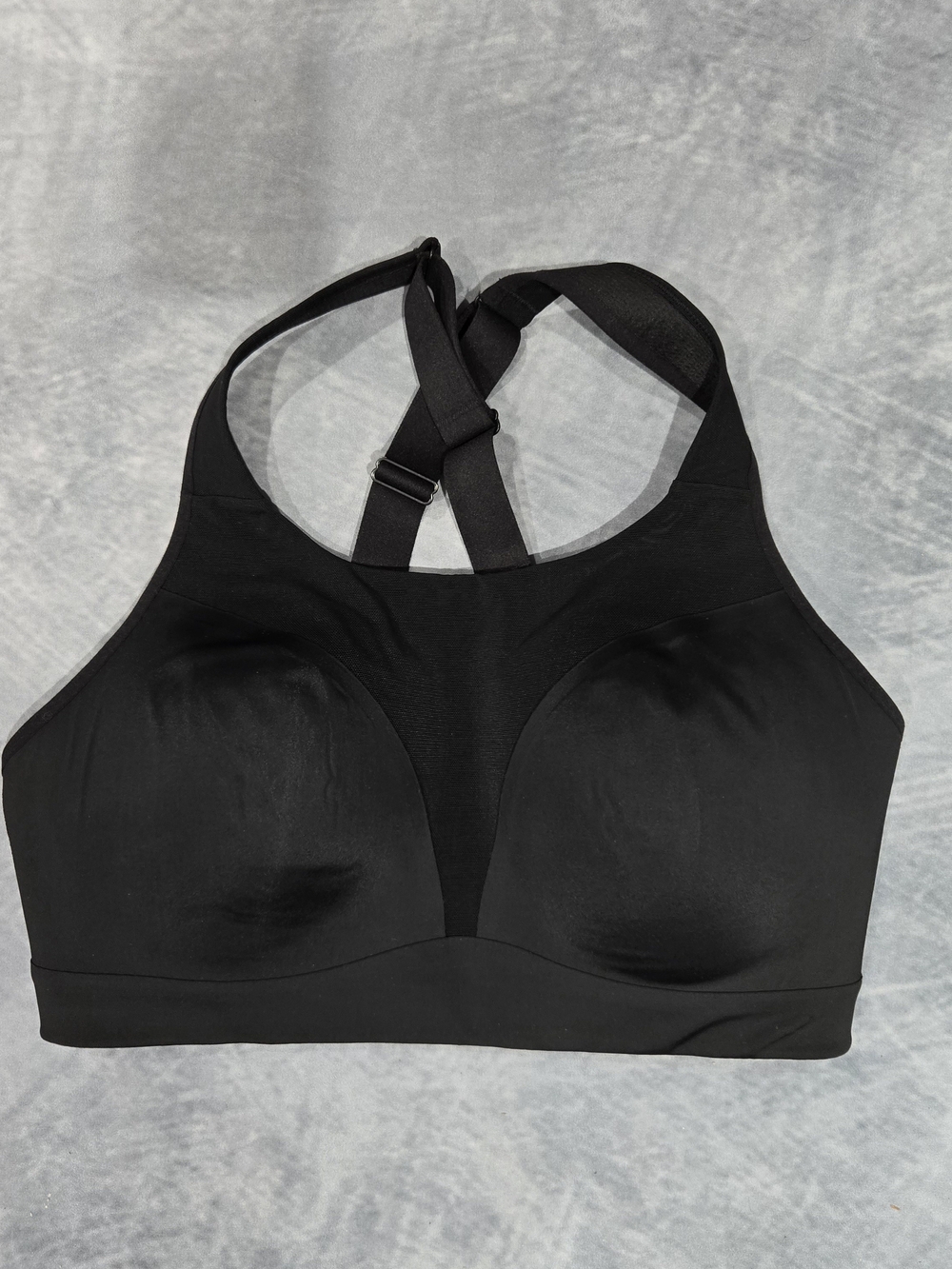Athleta Speed Run High Support Sports Bra featuring adjustable straps and a mesh